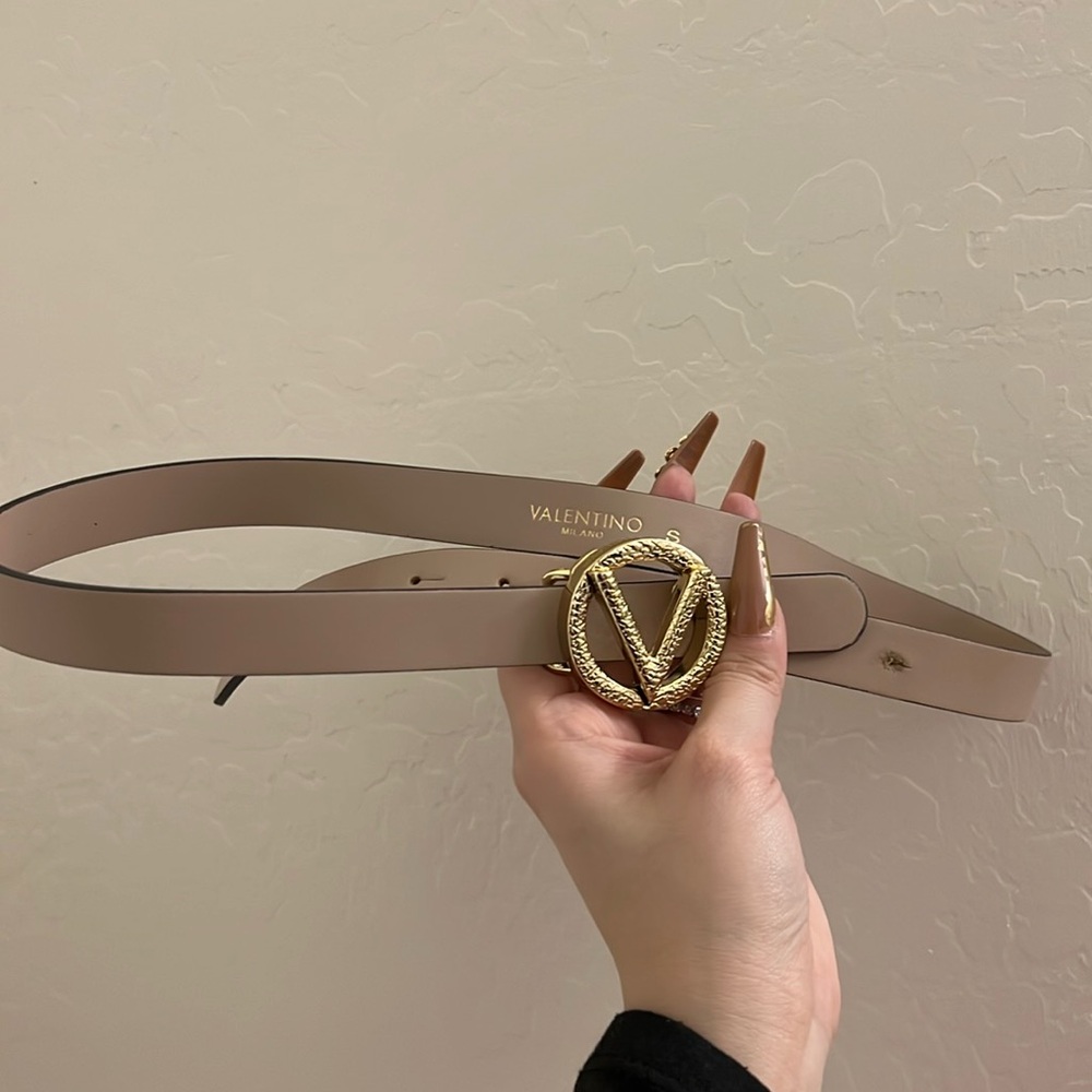 Valentino size S belt! Tried to add another hole, messed it up. Visible
